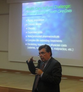 Michael S. Varadian, a senior health official from the U.S., addresses audience members during his seminar on the U.S. National Health Reform