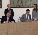 Vahagn Melikyan, MFA general secretary, and CHSS Dean Brian Ellison signing the MoU