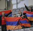 Group of friends waving Armenian flags